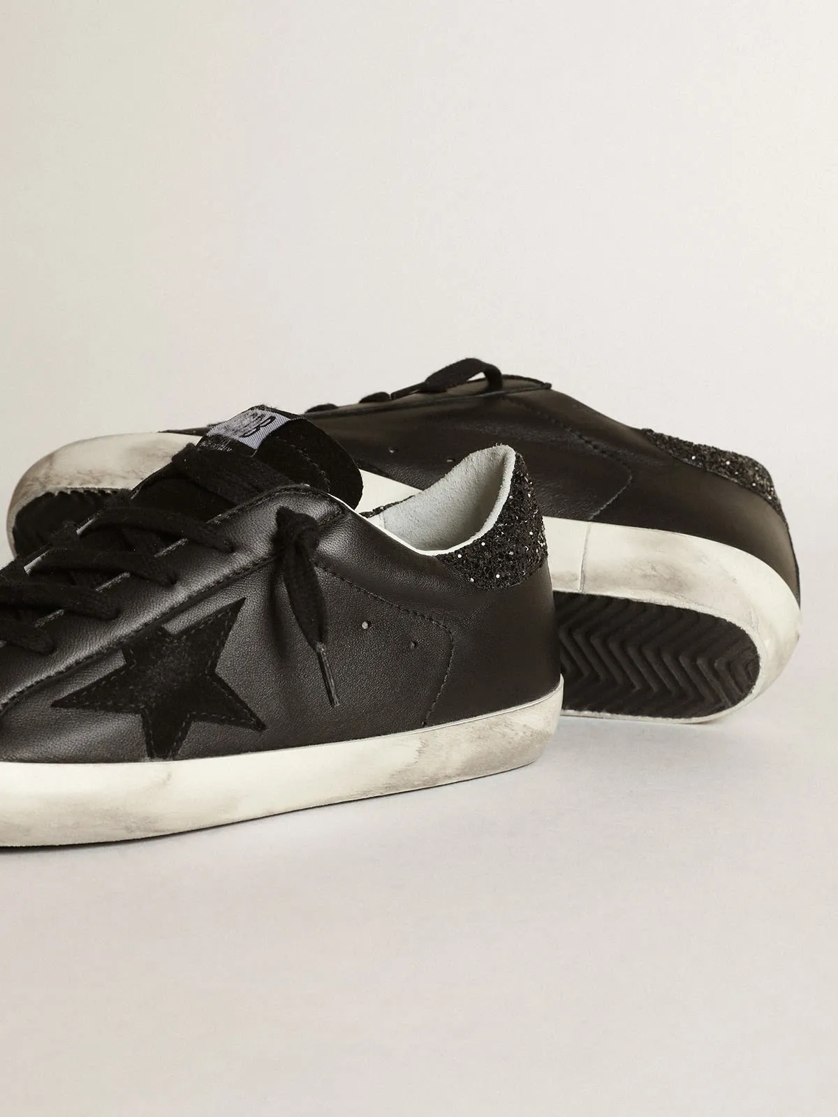 Super Star in Black Nappa w/ Black Star and Glitter Heel Tab